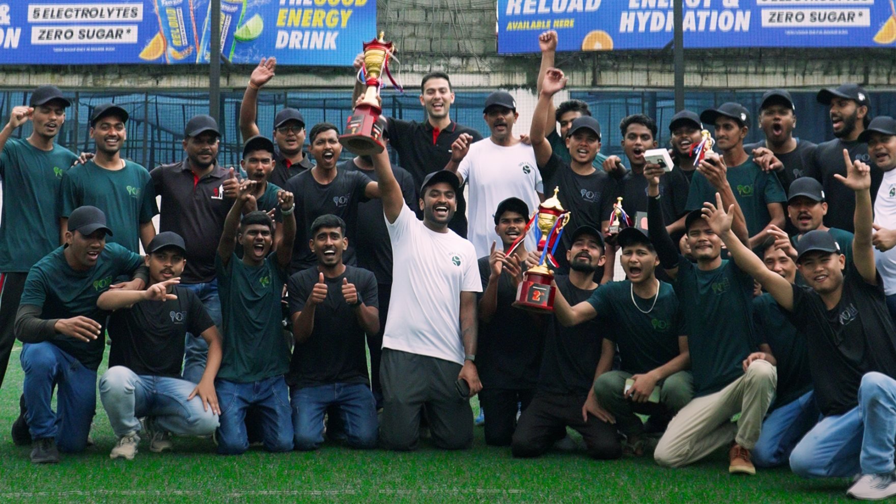 The Tiger 5 team and players celebrating with trophies